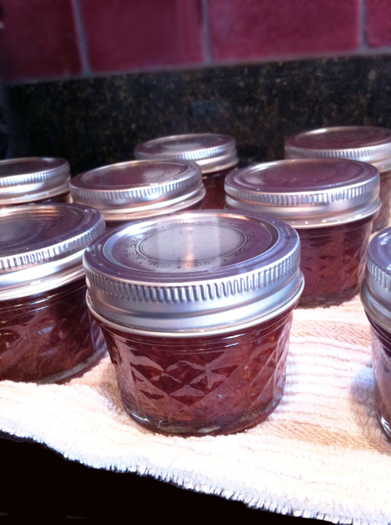 canning jars cooling on towel